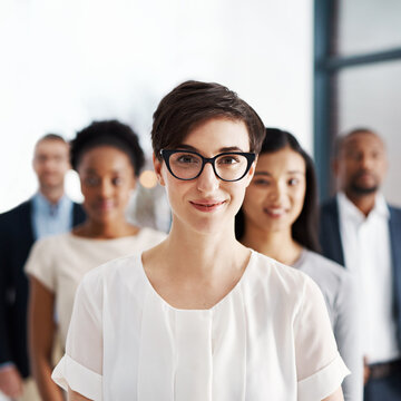 Leader, Manager And Boss Of A Diverse Team Feeling Motivated And Confident With Good Support, Trust And Leadership In Workplace. Portrait Of A Strong Female Entrepreneur With A Positive Mindset