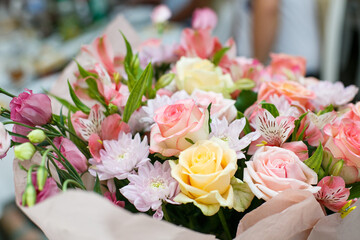 Close up of a festive bouquet of fresh flowers made in pink.
