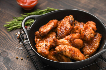 Spicy chicken wings with  ketchup