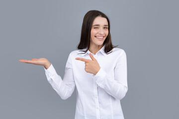 Woman point at copy space, showing copyspace pointing. Promo, girl showing advertisement content...