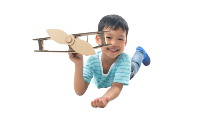 kid dreams as pilot laying and holding airplane paper isolated on white background,imagination and freedom  idea concept