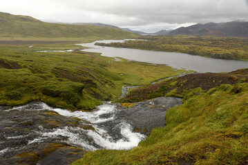 Naklejka na ściany i meble View at a river on Snaefellsnes penisola on Iceland