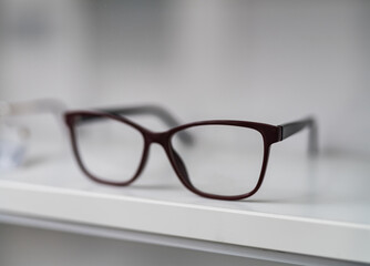 Fototapeta na wymiar Close up view of modern eyeglasses. Eyewear accessory on white background.