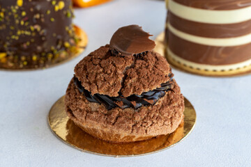 Types of cakes. Small sweet cakes on a white background. Bakery products. close up