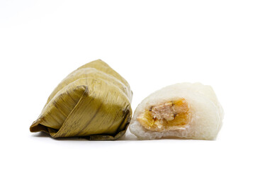 Stream wrapped Sticky Rice in banana leaf  (Khao Tom Mat or Khao Tom Pad) isolated on the white background , Thai dessert