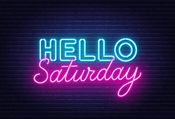 Hello Saturday sign on brick wall background. © TanyaFox