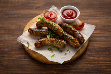 Close up of lamb beef grilled sausages smoked food