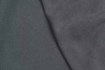 Fleece fabric blue top view. Texture of textile fleece bedspread.	