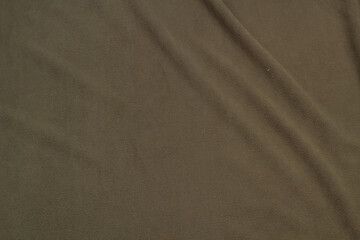 Fleece fabric top view. Texture of textile fleece bedspread.	