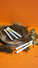 View of tobbacco heap and cigarette use