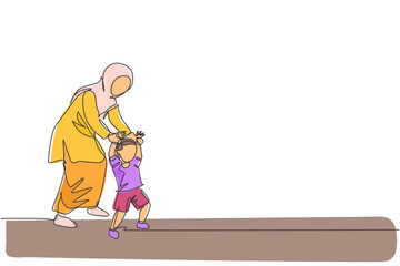 One single line drawing of young Arabian mother holding her son's hand, teaching how to walk vector illustration. Happy Islamic muslim family parenting concept. Modern continuous line draw design