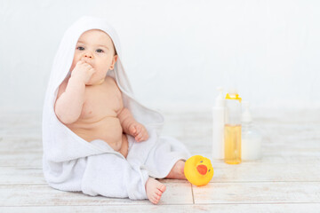 portrait of a baby in foam, bathing and hygiene of the baby