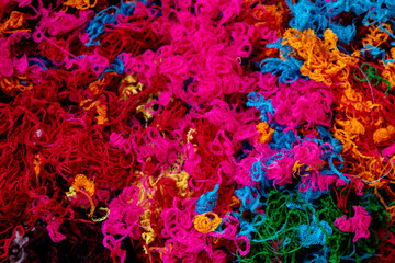 Colorful textured background. close up. selective focus. cut out wool