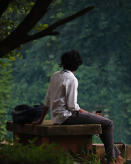 man sitting on a bench