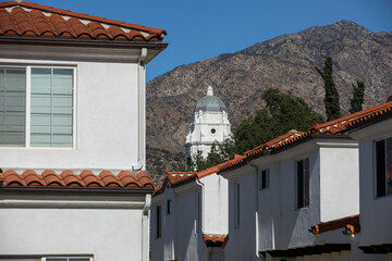 Afternoon view of a historic church and housing in downtown Monrovia, California, USA.