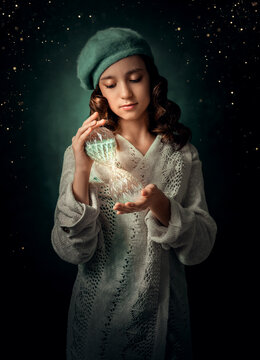 Fairytale portrait of a girl with an hourglass. The girl has a biret on her head. She looks at her watch.