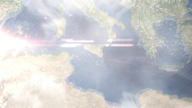 Earth zoom in from outer space to city. Zooming on Gela, Caltanissetta, Italy. The animation continues by zoom out through clouds and atmosphere into space. Images from NASA