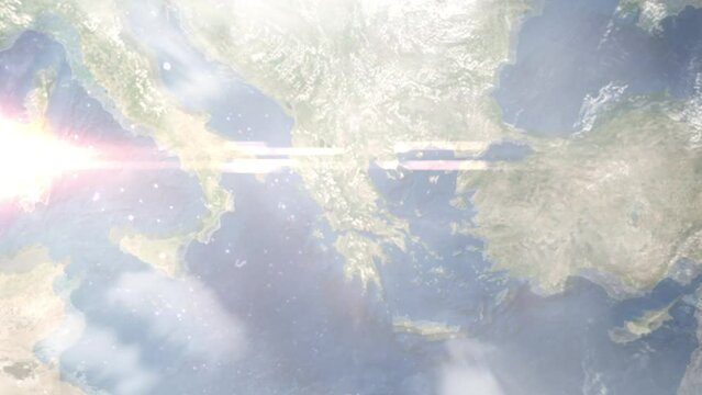 Earth zoom in from outer space to city. Zooming on Karditsa, Greece. The animation continues by zoom out through clouds and atmosphere into space. Images from NASA