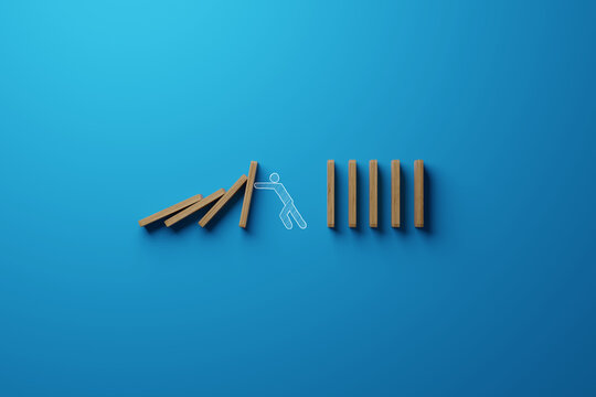 The man stops falling dominoes. The concept of showing strength in business. 3d render