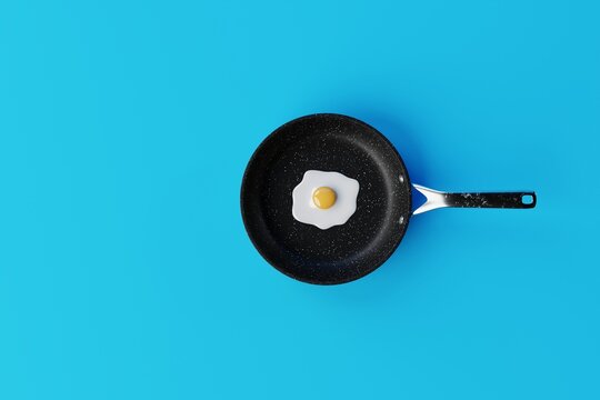 Pan with a fried egg on a blue background. The concept of preparing a dish with egg, frying an egg in a pan. 3d render, 3d