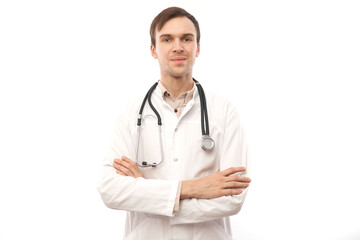 Fototapeta premium Portrait of handsome doctor in white medical coat with stethoscope on white background with copy space