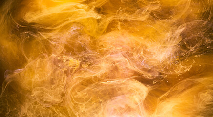 Liquid fluid art abstract background. yellow dancing acrylic paints underwater, space smoke ocean © amixstudio
