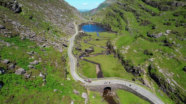 Aerial view of Gap of Dunloe, also known as Bearna an Choimin,  a narrow mountain pass running north south in County Kerry, Ireland