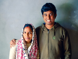 South asian mother with son, bangladeshi hindu religious family 