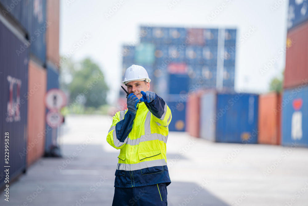 Poster Foreman checking Containers box with shipping containers before departure for export business logistic company .