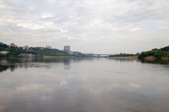 Photo of the city on the river in cloudy day