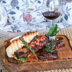 beef steak with red wine on the table