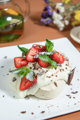 meringue dessert with strawberries