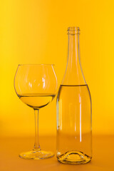 white wine in a bottle with a glass