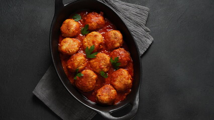 Meatballs in sweet and sour tomato sauce with spices
