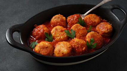 Meatballs in sweet and sour tomato sauce with spices