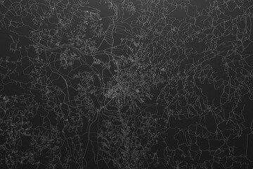 Street map of Antananarivo (Madagascar) on black paper with light coming from top