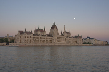 Fototapeta na wymiar Hungarian Parliament with the moon