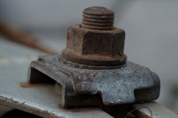 Obraz na płótnie Canvas rusty bolt on old bicycle axle