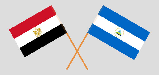 Crossed flags of Egypt and Nicaragua. Official colors. Correct proportion