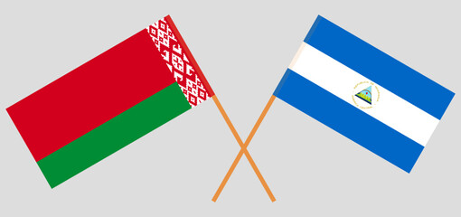 Crossed flags of Belarus and Nicaragua. Official colors. Correct proportion