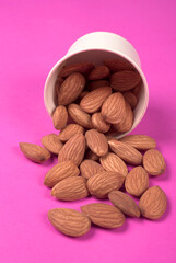 Almonds top view isolated on white background.