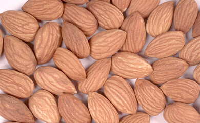 Almonds top view isolated on white background.