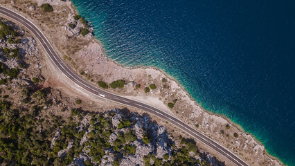 Beautiful view of the Aegean coast. Beautiful colorful sea. Beautiful water. Road along the sea. Beautiful nature. Sunny day.