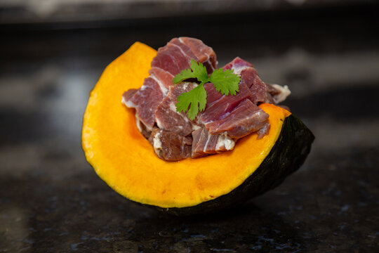 Traditional Pumpkin with jerked beef in selective focus. Typical Brazilian dried meat dish. Known as "jab&aacute; com jerimum".
