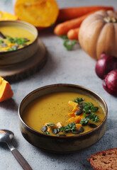Bowls served with seasonal pumpkin soup	