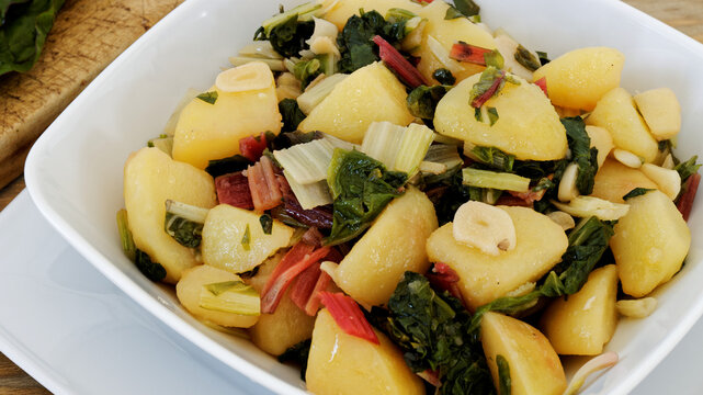 Blitva dish made with boiled potatoes, swiss chard, garlic and olive oil. South Croatian cuisine.