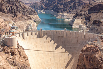 high view of the Hoover Dam in a sunny day between the states of Arizona and Colorado
