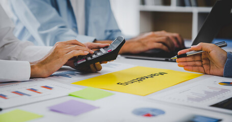 marketing team meeting business people are meeting There are data sheets and charts on the table to support your business planning meetings for growth. business idea