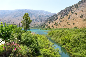 Fototapeta na wymiar Mountain lake with turquoise water. Beautiful mountain landscape with a lake.