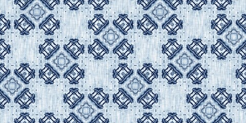 Fototapeta premium Indigo dye wash coastal damask seamless border pattern. Washed out geometric dip dyed blur effect edging. Nautical and marine ocean blue masculine endless tape background with linen texture trim.